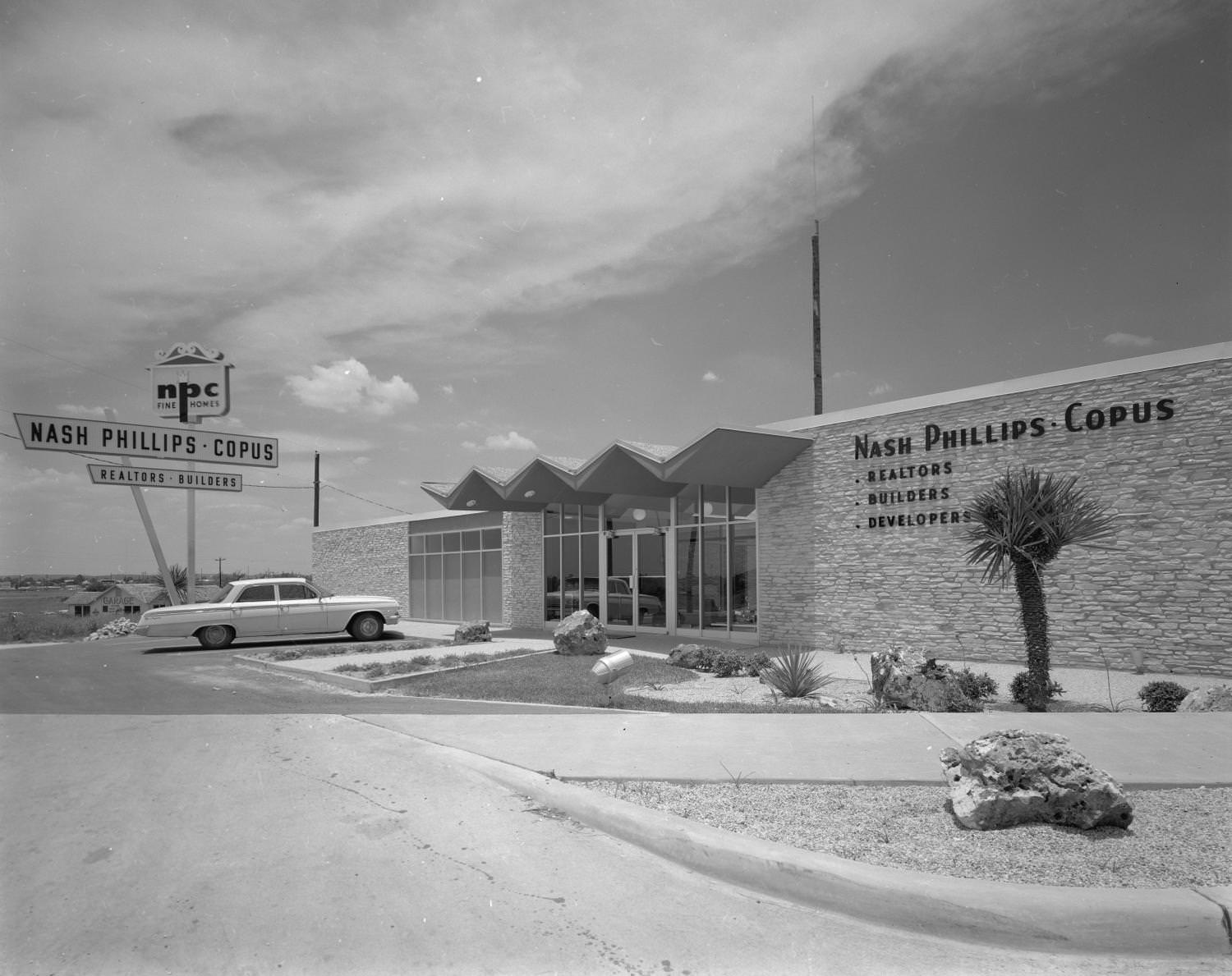 The exterior of the Nash Philips-Copus realtor office, since demolished, on 6010 Brooks Street, 1964
