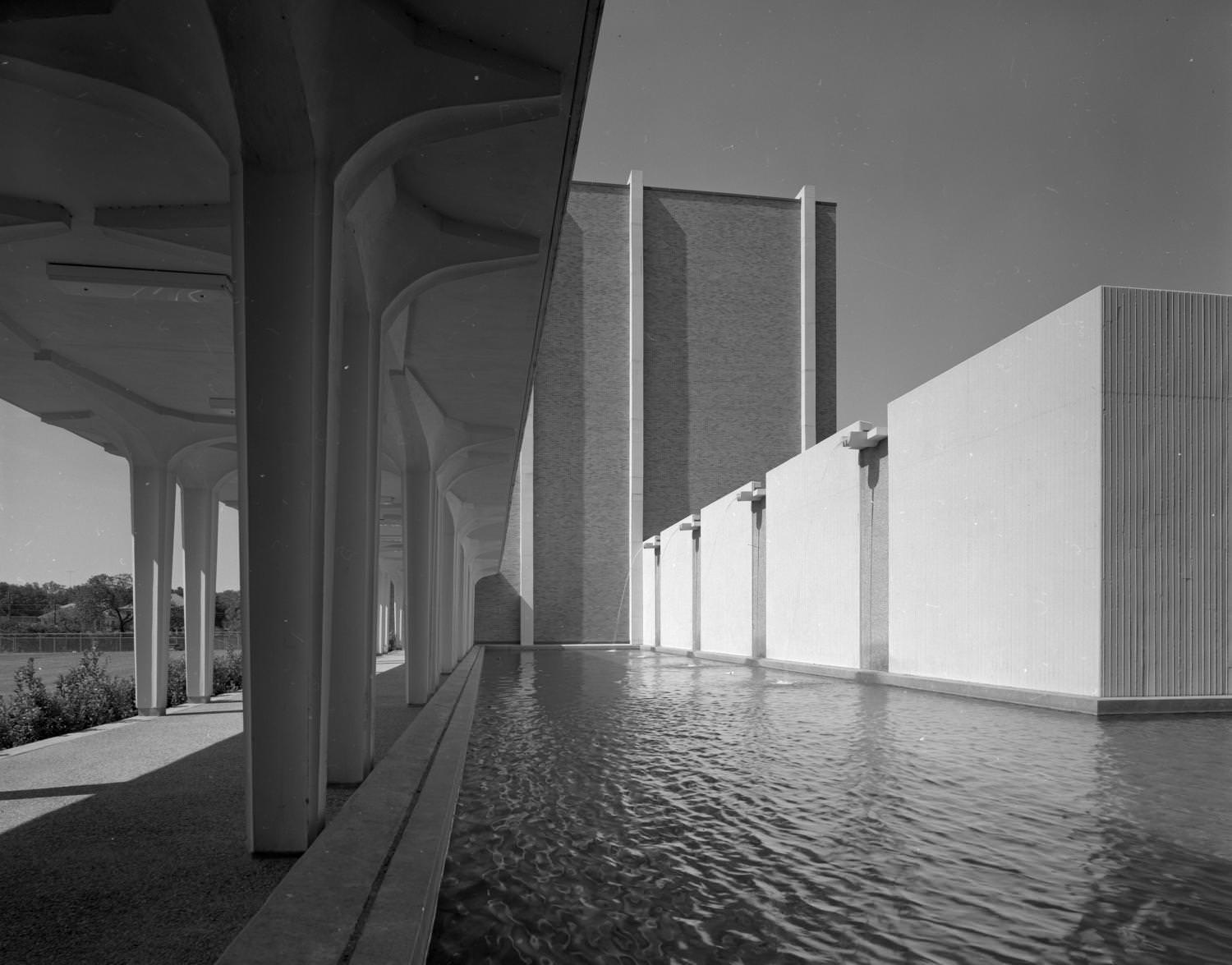 A shallow fountain pool at University of Texas's engineering science building, 1967