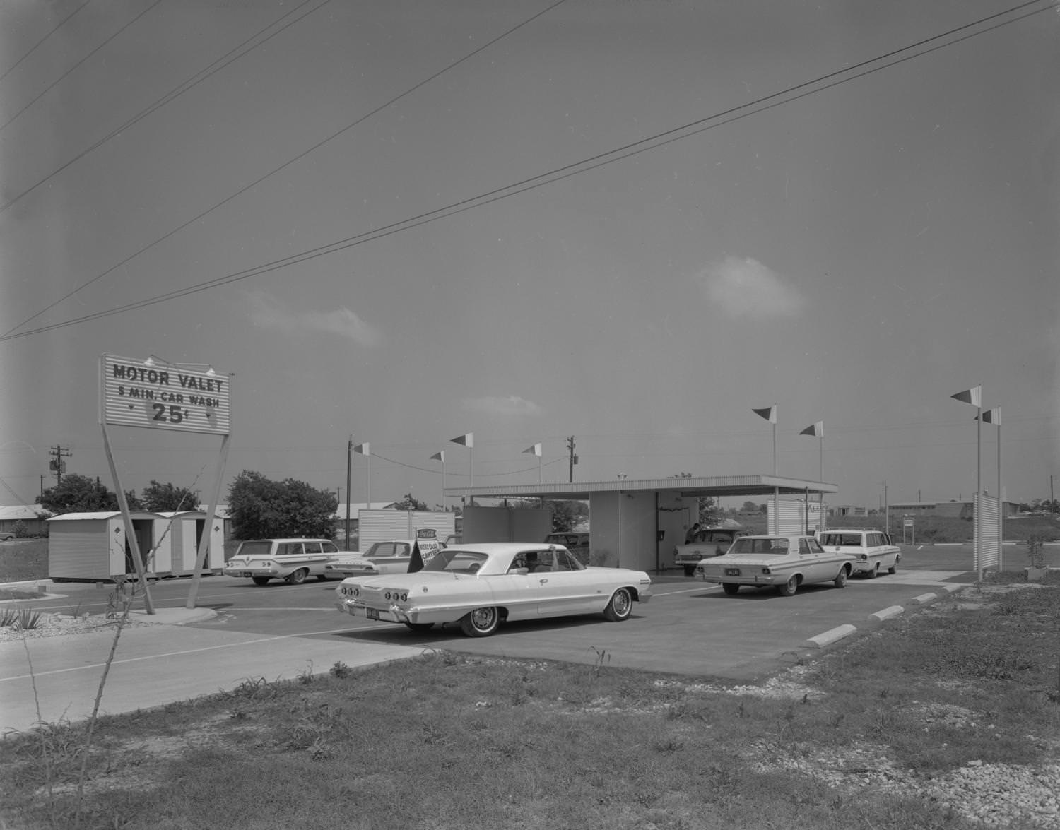 A self-use car wash station called the Motor Valet, 1964