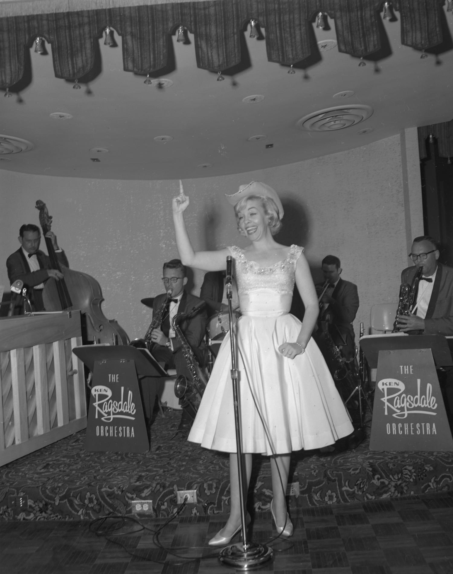 A performer on stage during the opening night of Club Caravan, located at 2360 North Interstate 35, 1961