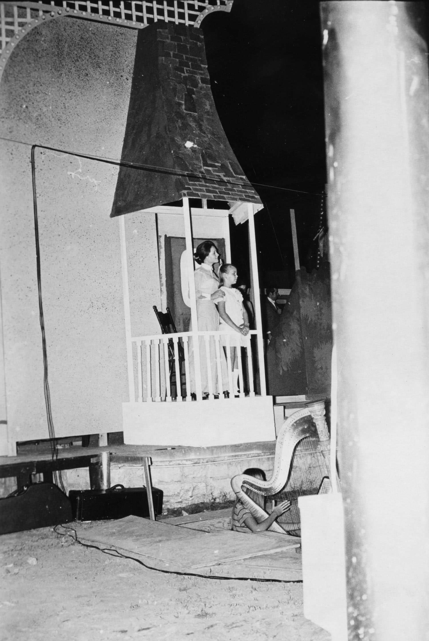 Two actresses on stage during a theatrical production of "Music Man" at Zilker Hillside Theater, 1969