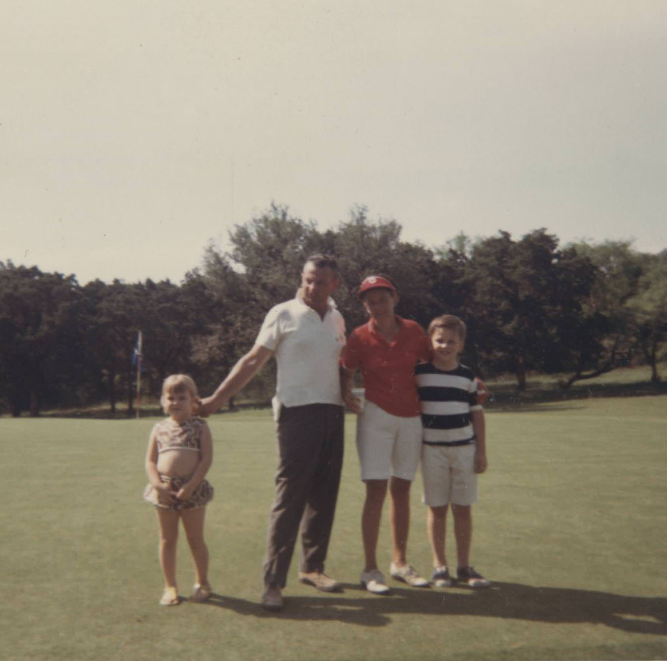 Austin Women's Public Links Golf Association golfer and family at Municipal Golf Course, 1966