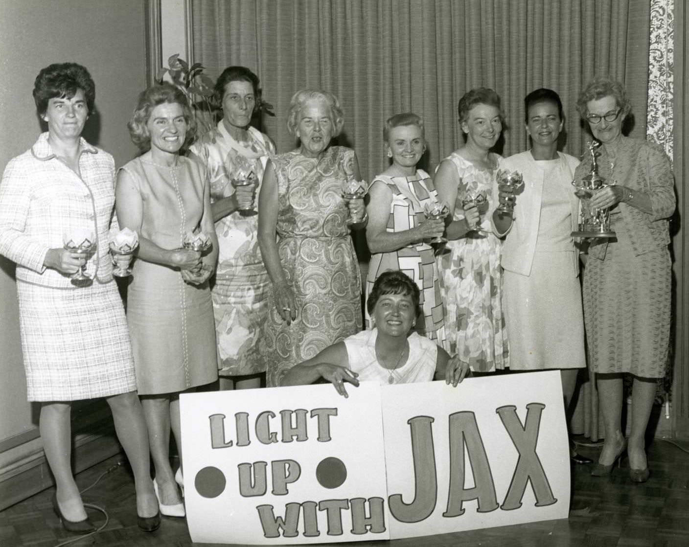 Group portrait of ladies from the Austin Women's Public Links Golf Association, 1960s