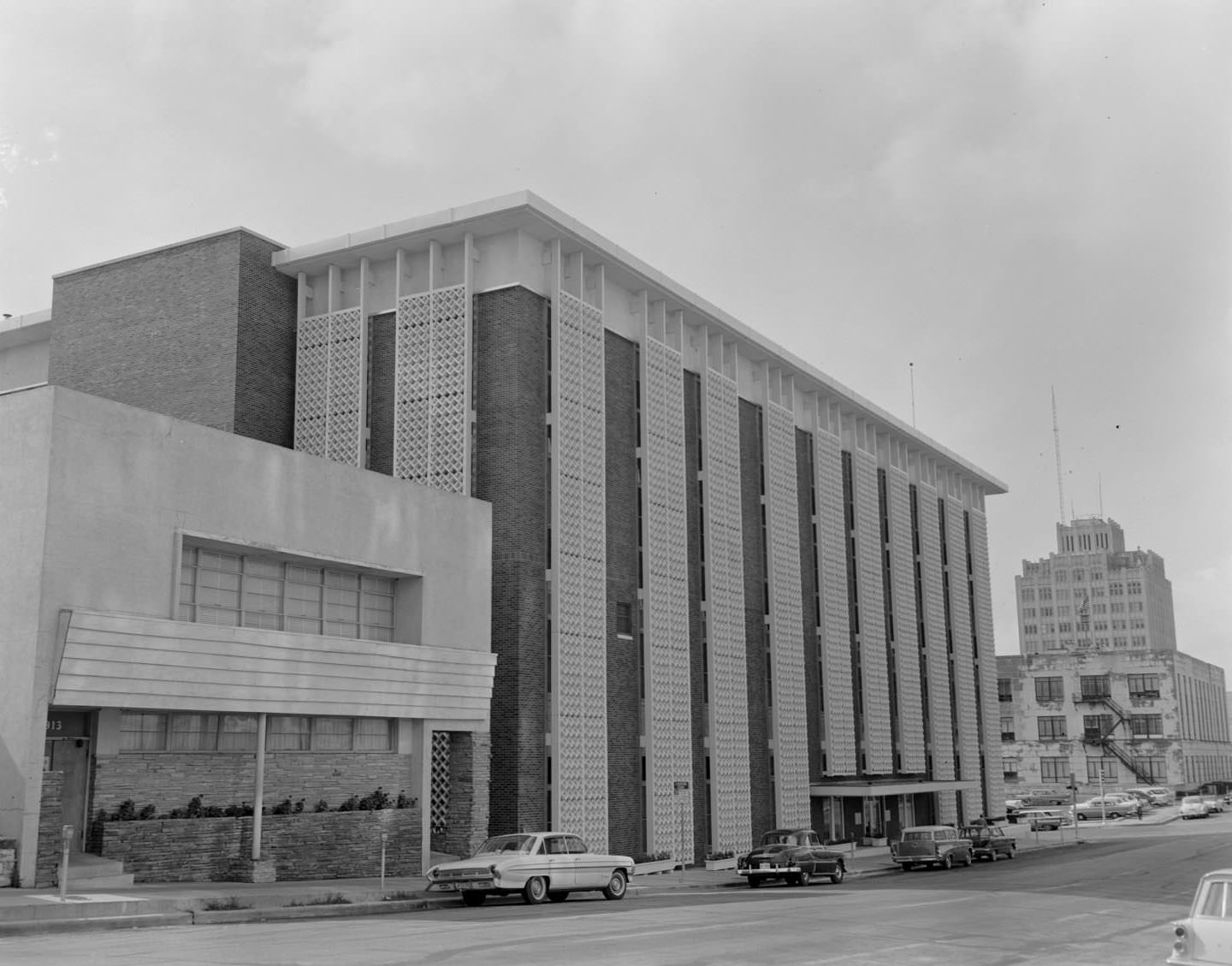 Exterior view of completed building, 1961. Southwestern Bell Telephone building with the Norwood Towers building in the right.