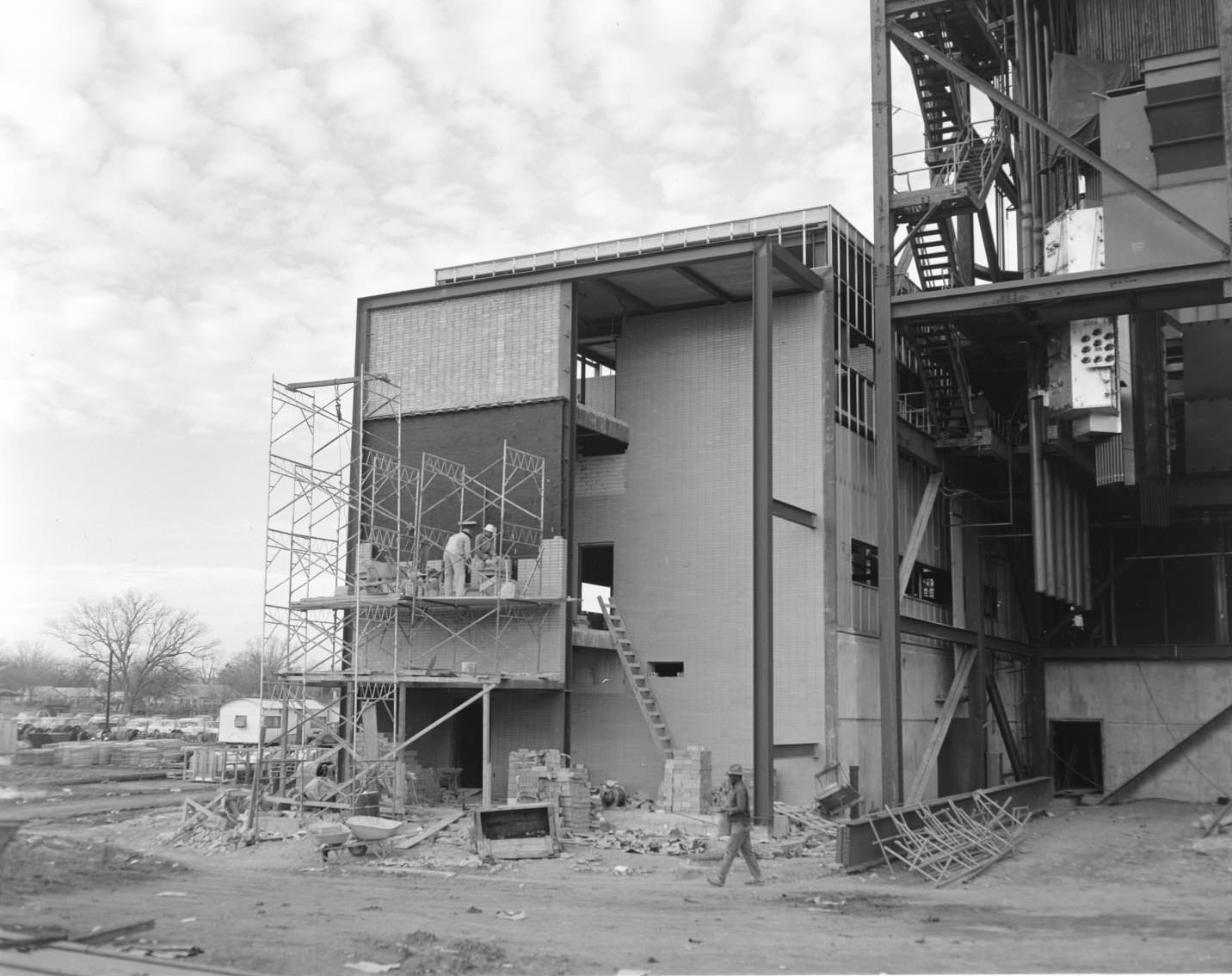 Construction on exterior of power plant power. Austin, Texas, 1960