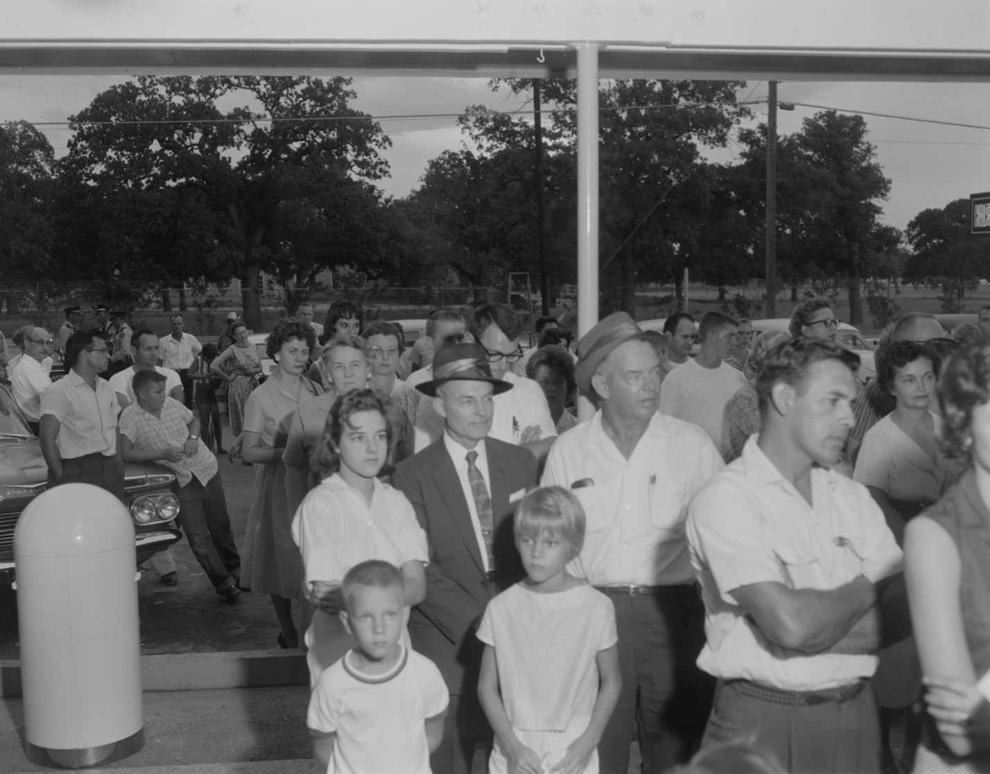 Crowd standing in front of Kentucky Fried Chicken stand, Austin, 1960