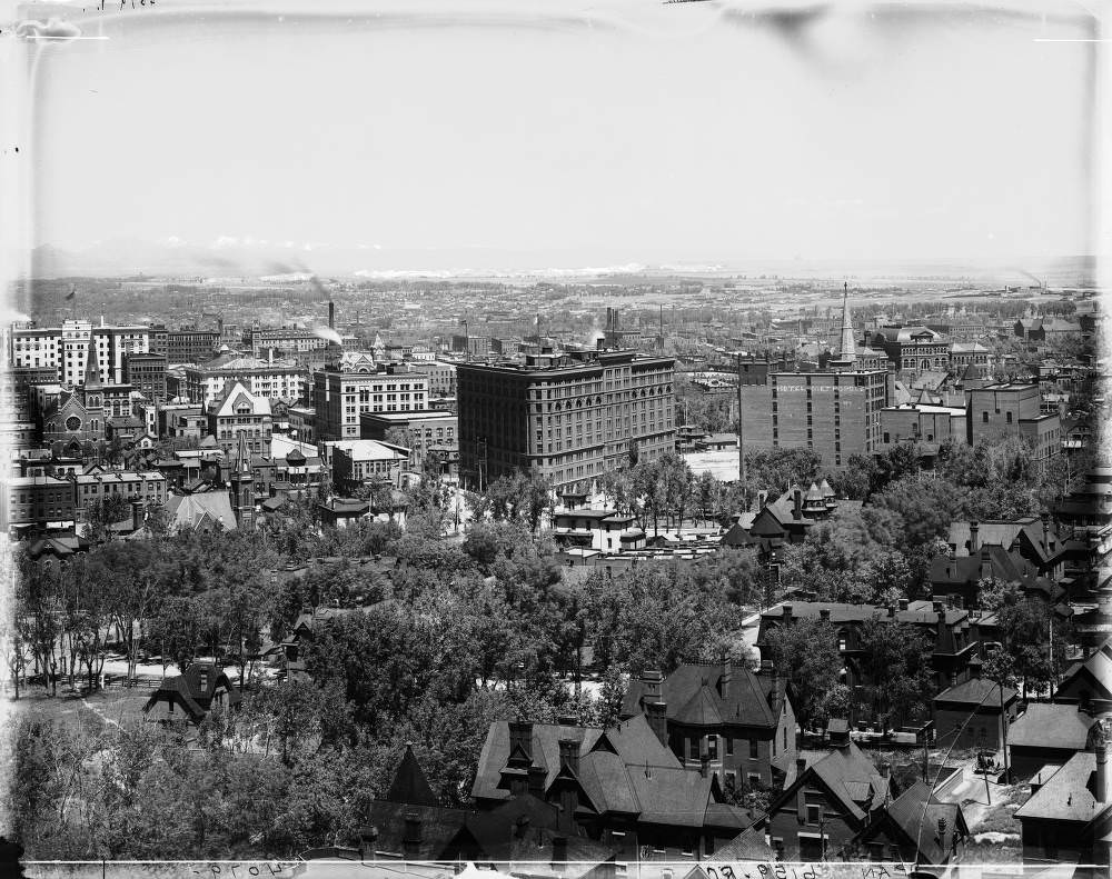 Panoramic view of the central business district of Denver, Colorado from the State Capitol Building. Shows the Brown Palace Hotel, Denver Club Building, 1900s