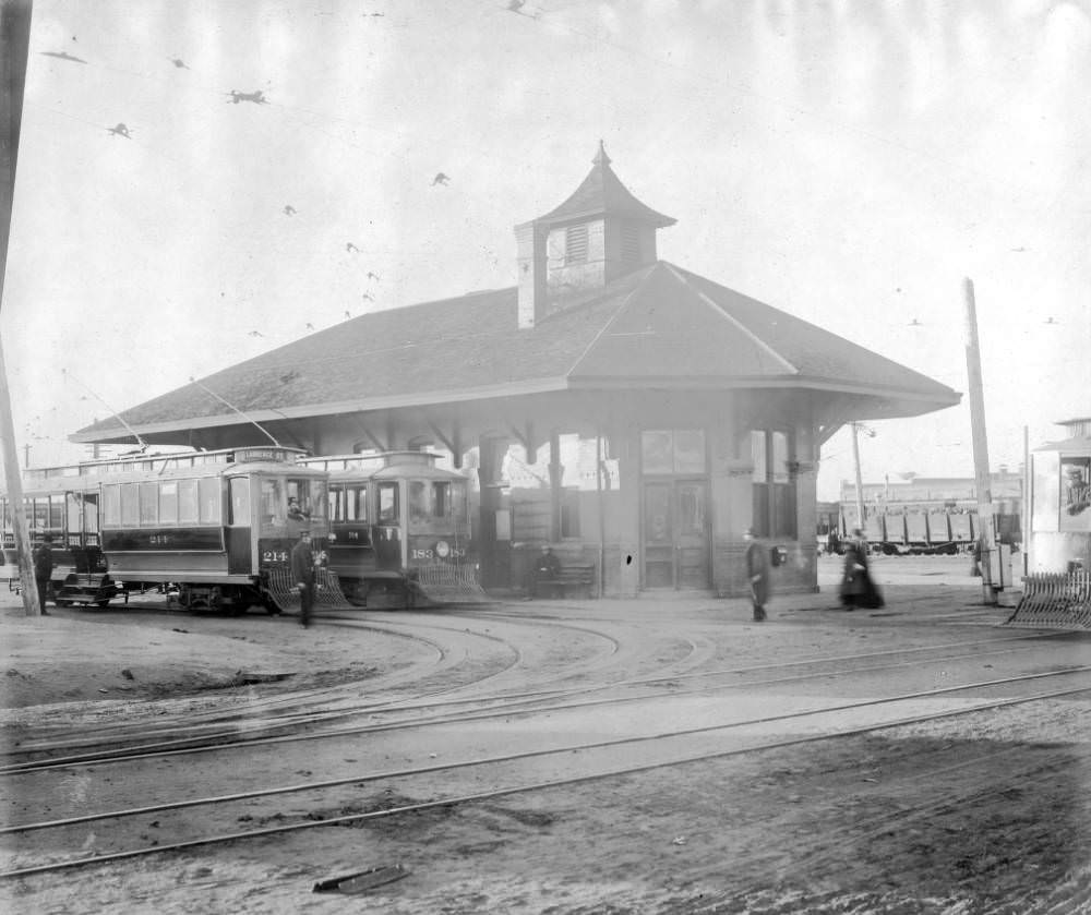 Denver Tramway Company station, with conductors and trolley cars Lawrence Street number 214, and Larimer Street number 183, 1905