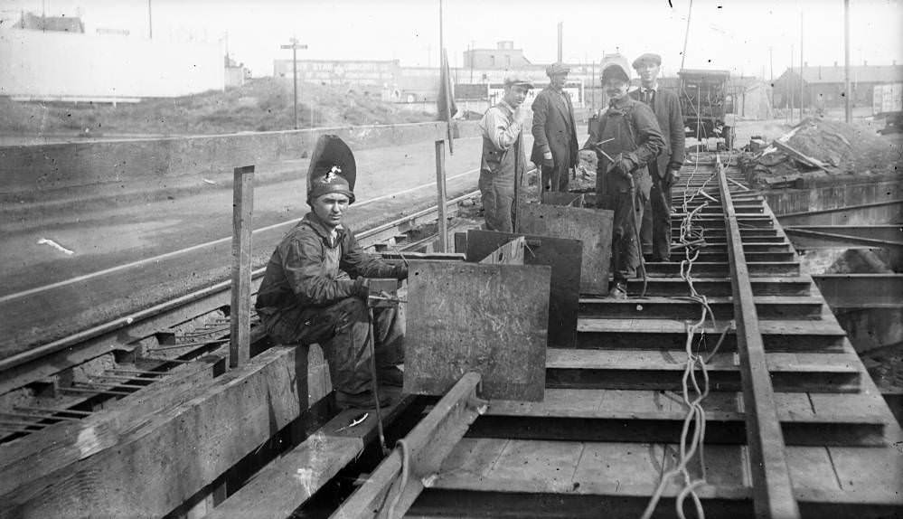 Men working on Denver City Tramway Company streetcar tracks in Denver, 1904