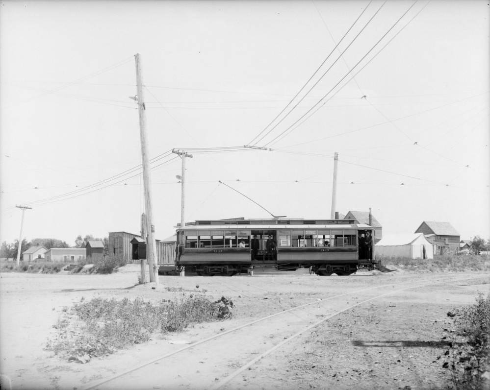 The Denver Tramway Company car #63 is at the Berkeley Loop at the end of the Berkeley, - Elitch line at Berkeley Park about 40th (Fortieth) and Yates in Denver, 1909