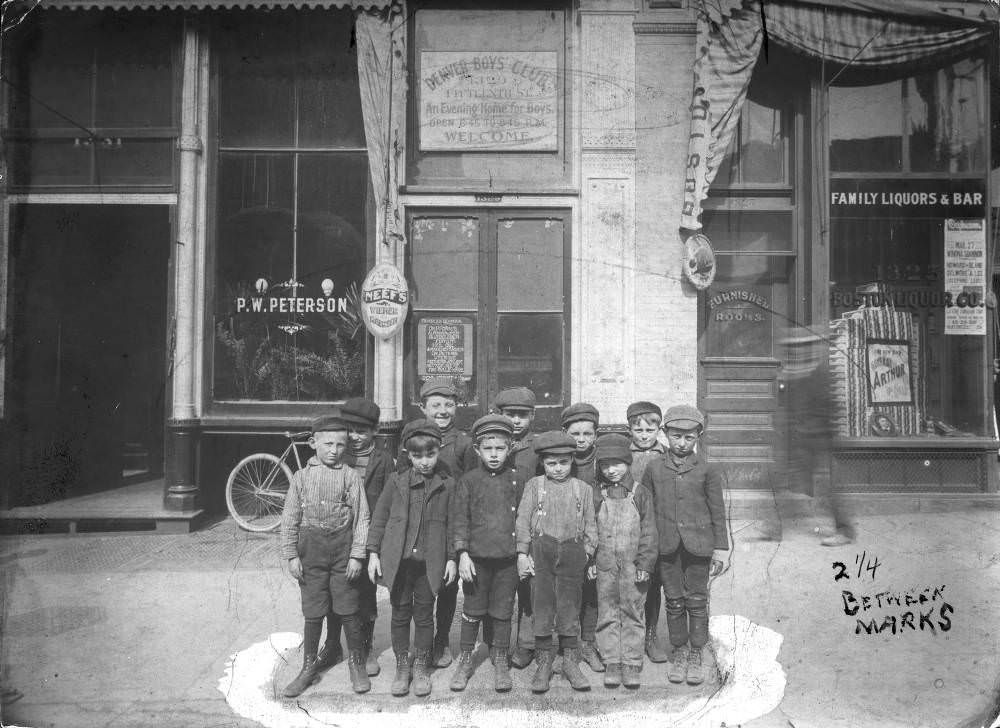 Young members of the Denver Boys Club stand in front of their building at 1329 15th (Fifteenth) Street in Denver, 1905