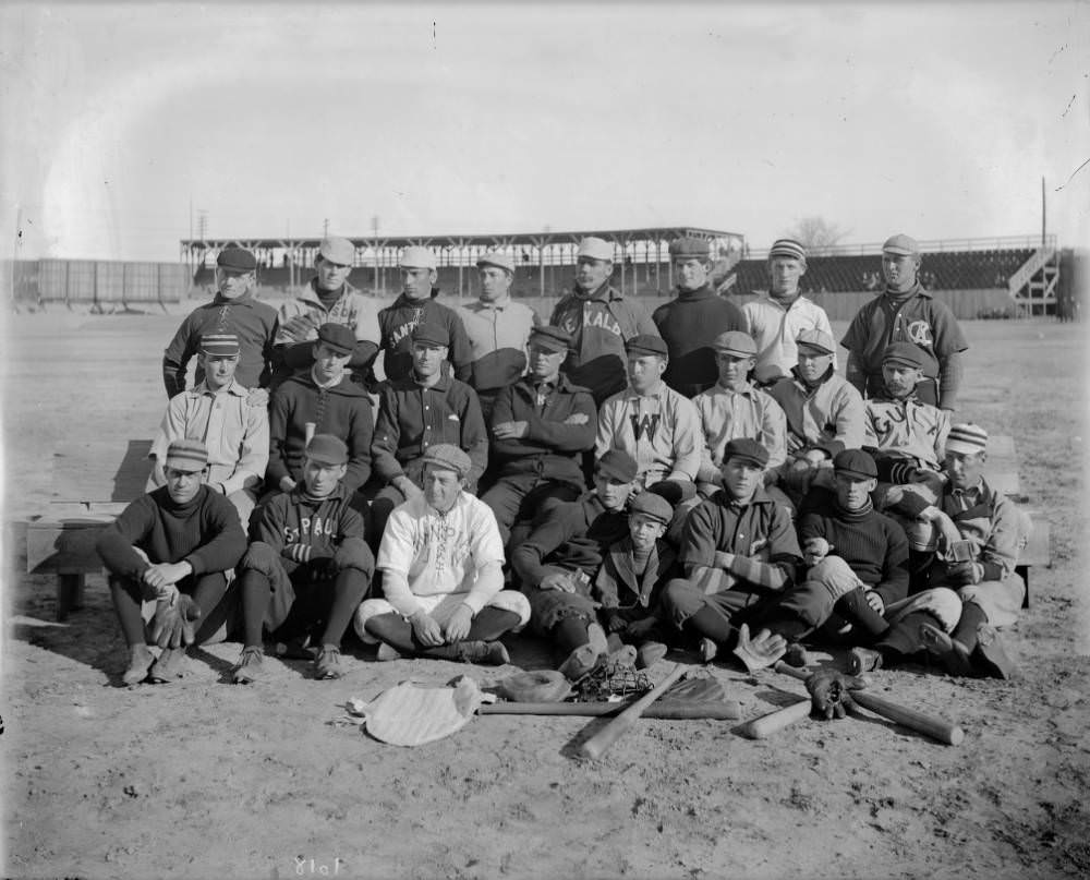 Members of the Denver Bears baseball team pose outdoors at a baseball field in Denver, 1909