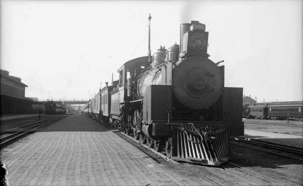 Engine No. 701 of the Denver and Rio Grand Railway is parked on the tracks at the Union Station in Denver, 1909