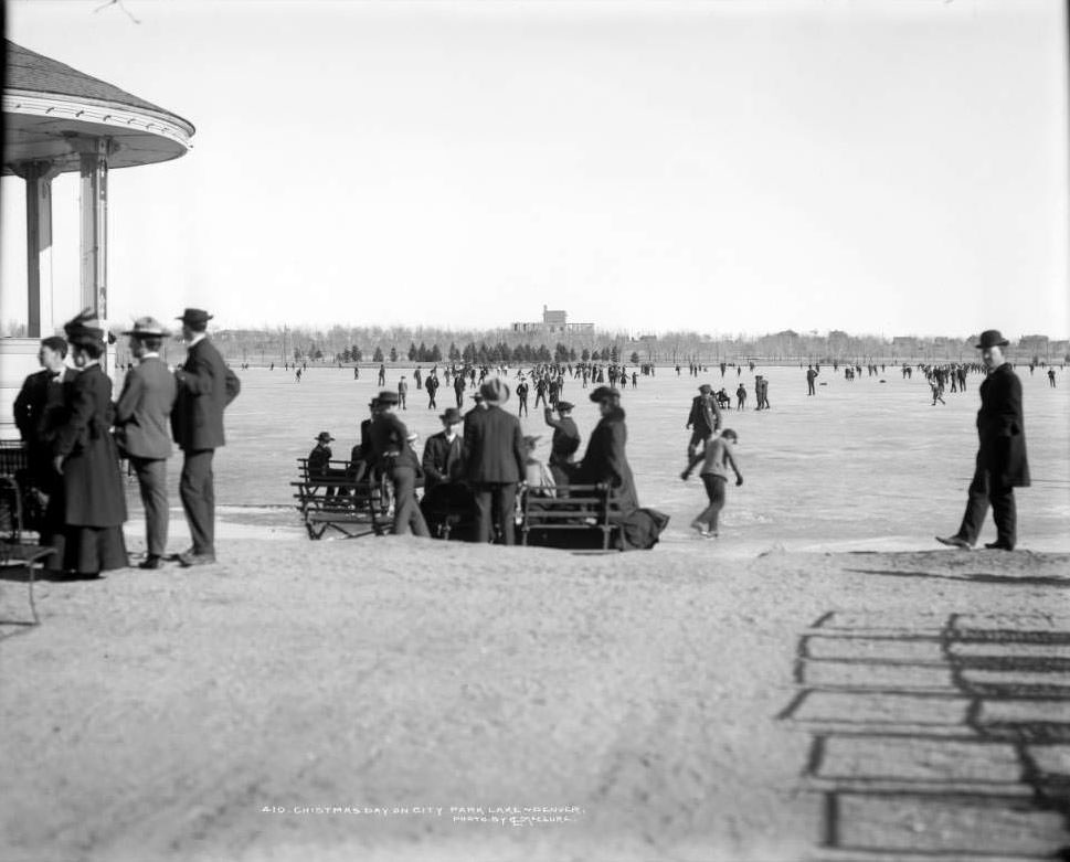 Ice skating on City Park Lake, Denver, Colorado, 1901. View east to Museum of Natural History building under construction.