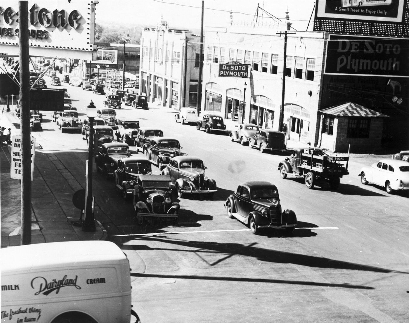 Looking west on West 7th Street from Henderson Street; Firestone building on left, 1940