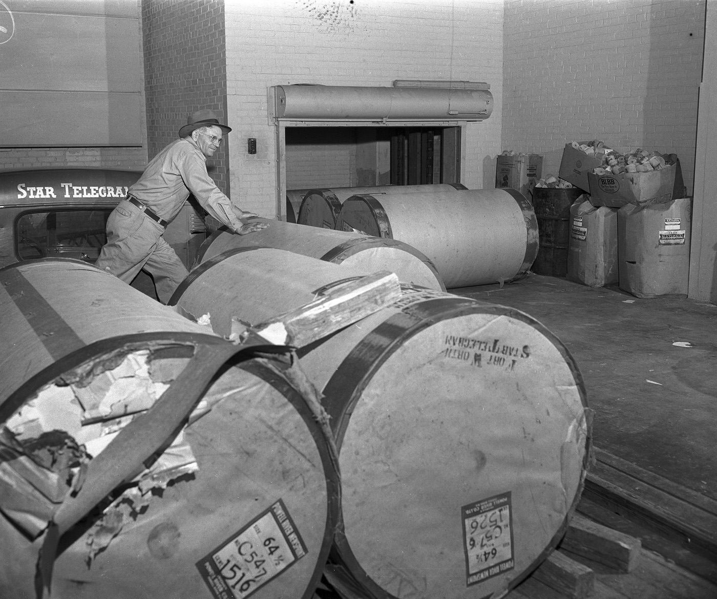 Newsprint being unloaded at the Fort Worth Star-Telegram, 1949