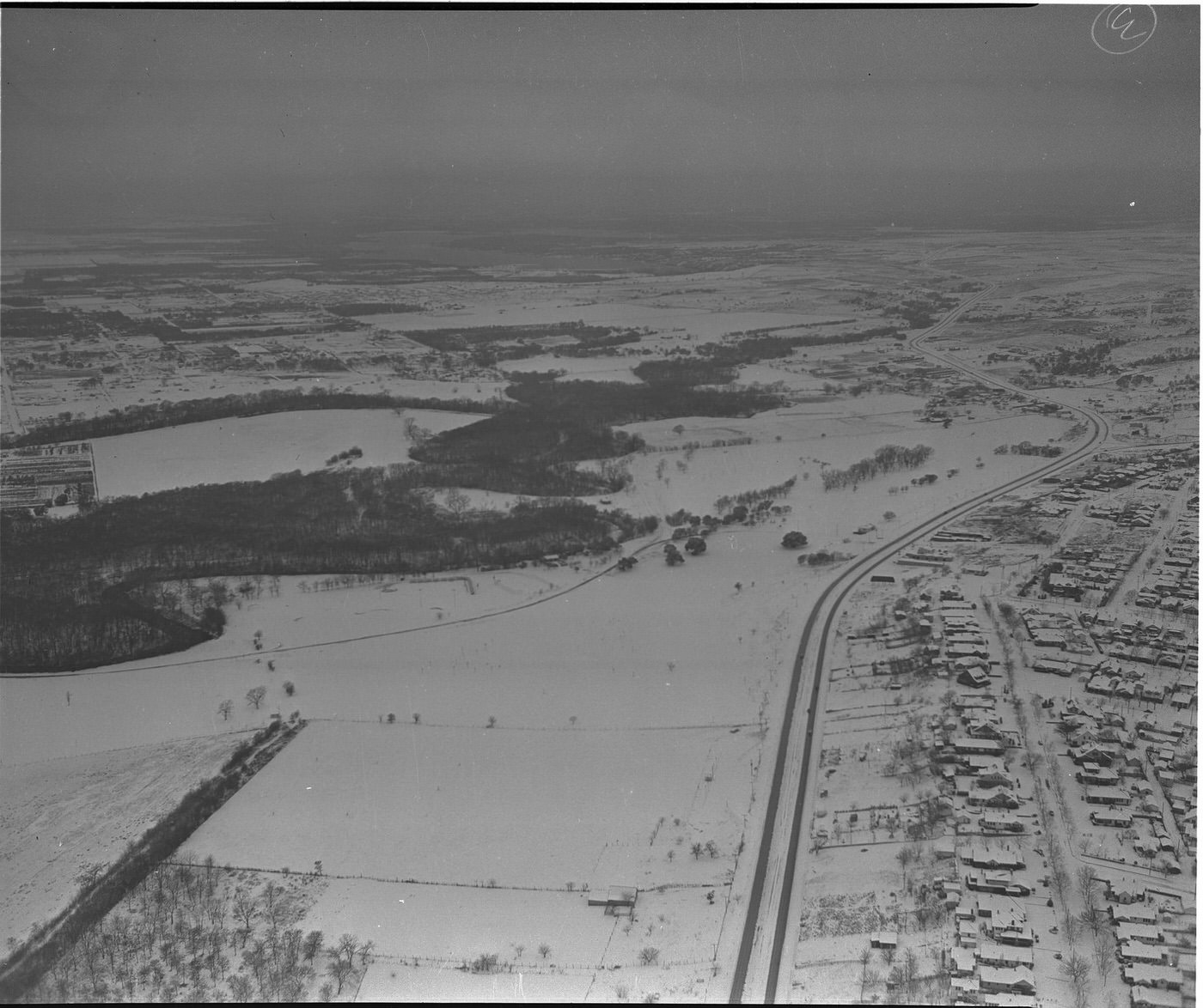 Aerial view of Rockwood Golf Course, covered in snow, 1940