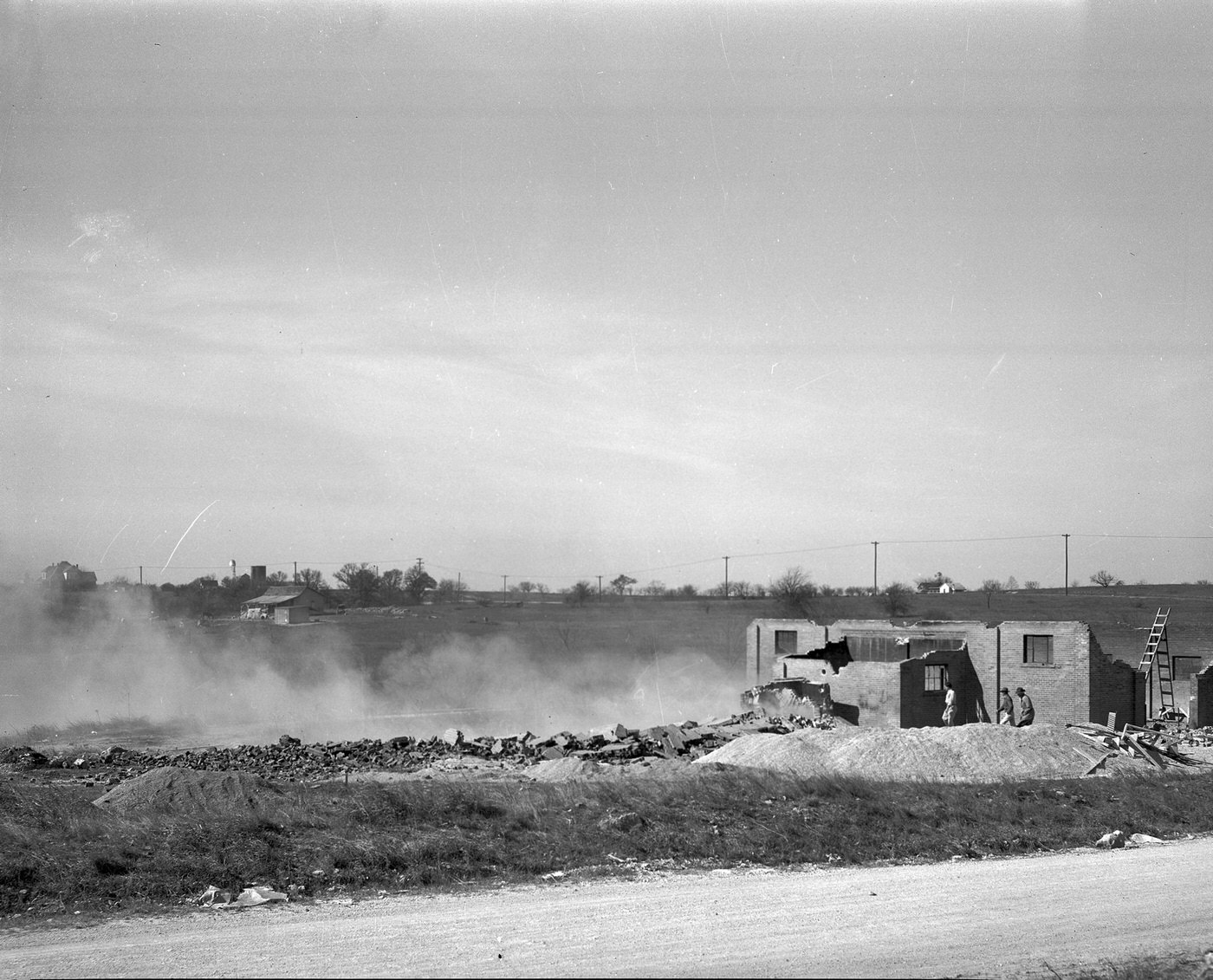 The Arlington Heights landmark demolition of a 75 foot incinerator, 1948