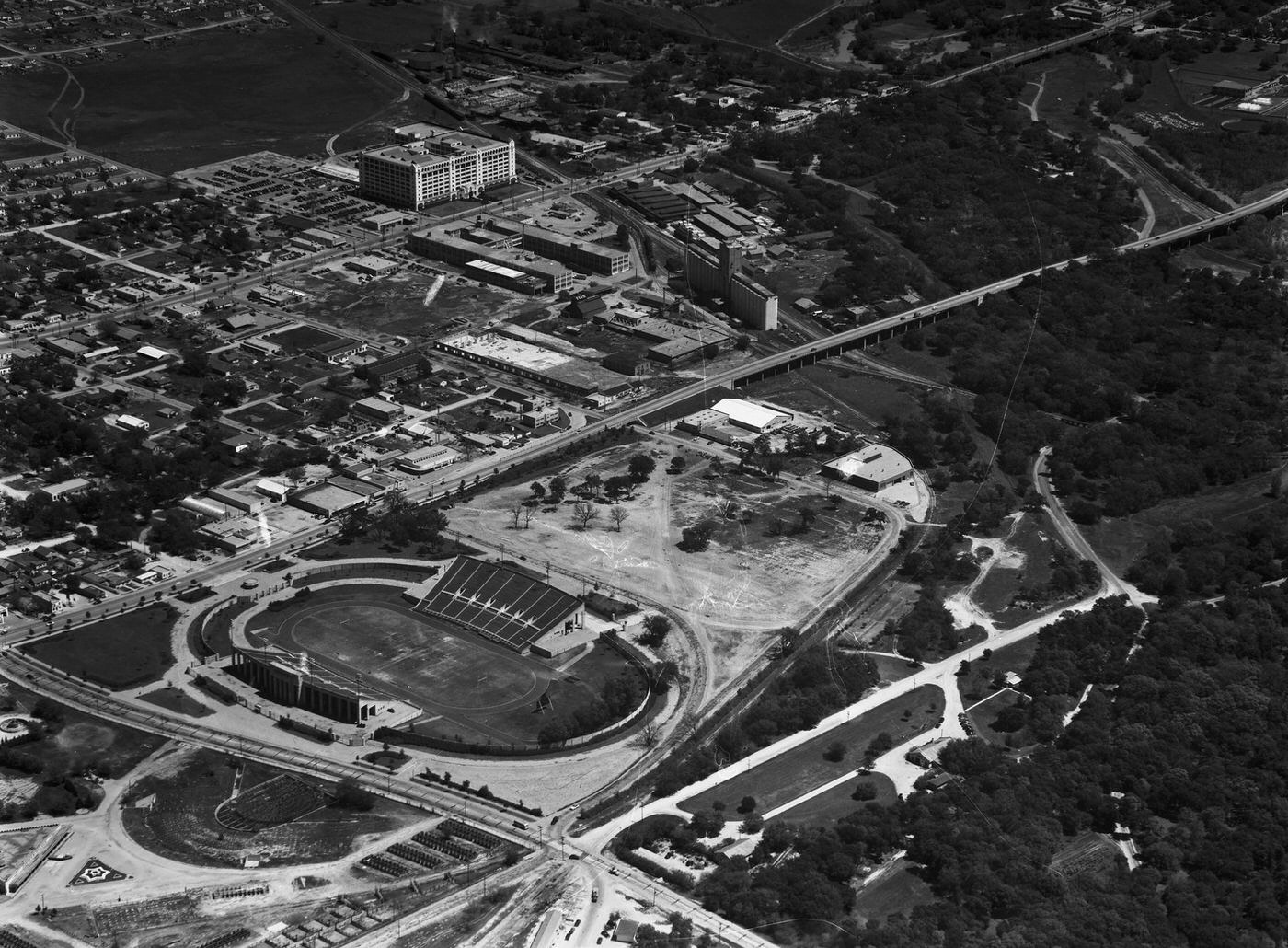 Aerial view of Farrington Field and the Casa Manana revolving stage, 1947