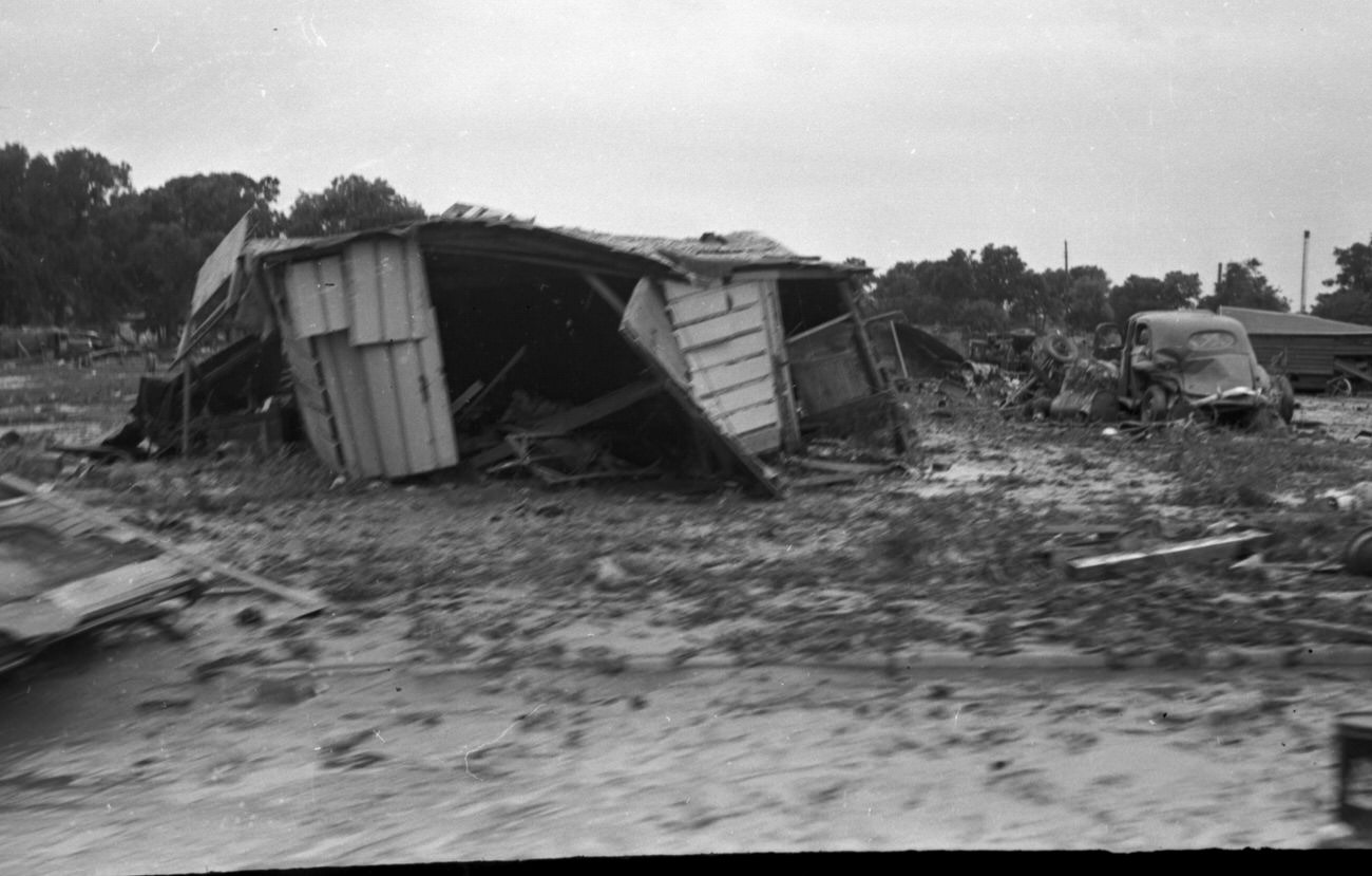 Flood scenes of commercial and residential buildings, 1949