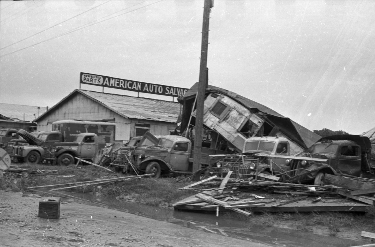 Flood scenes of commercial and residential buildings, 1949