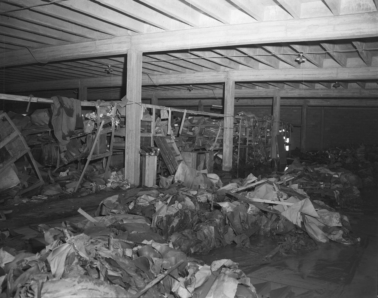 Flood damage to the interior of the Stationers Distributing Company, 1949