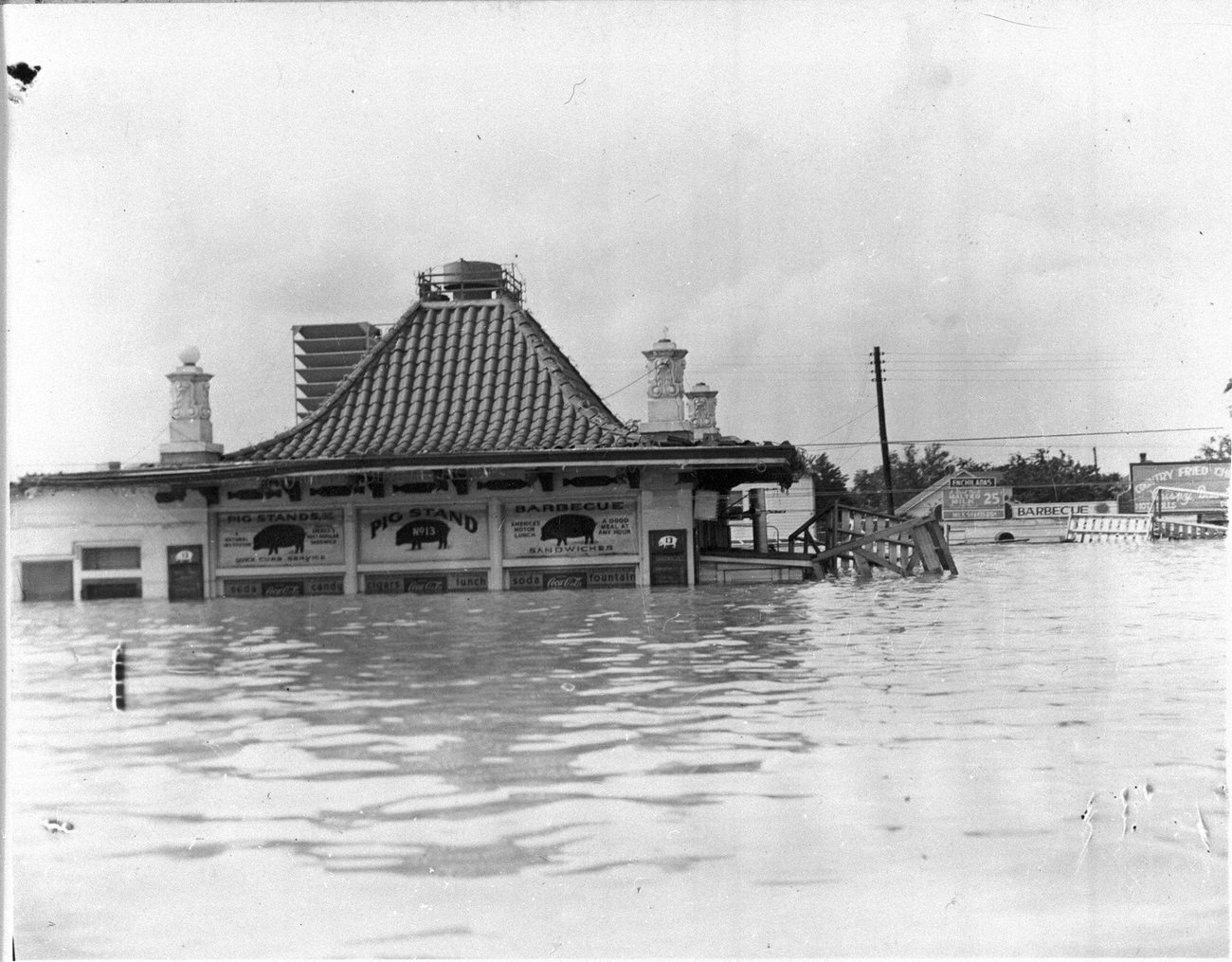 Pig Stand restaurant partially under water during the May 1949 flood in Fort Worth, Texas