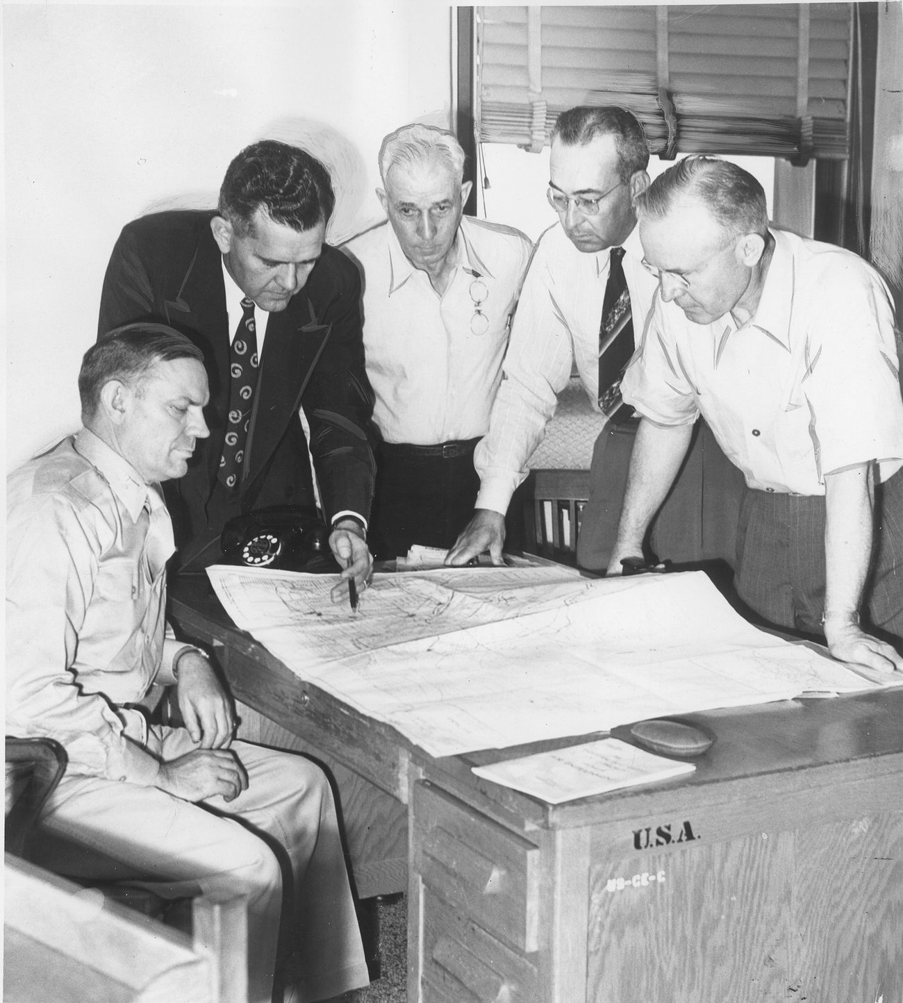 Group planning repairs after the Trinity River flooding in Fort Worth, Texas.