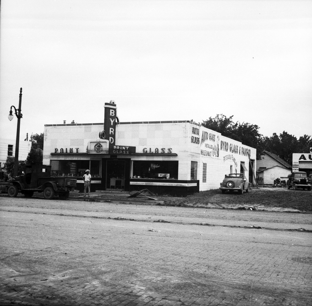 The Byrd Glass & Paint storefront after the 1949 Fort Worth flood.