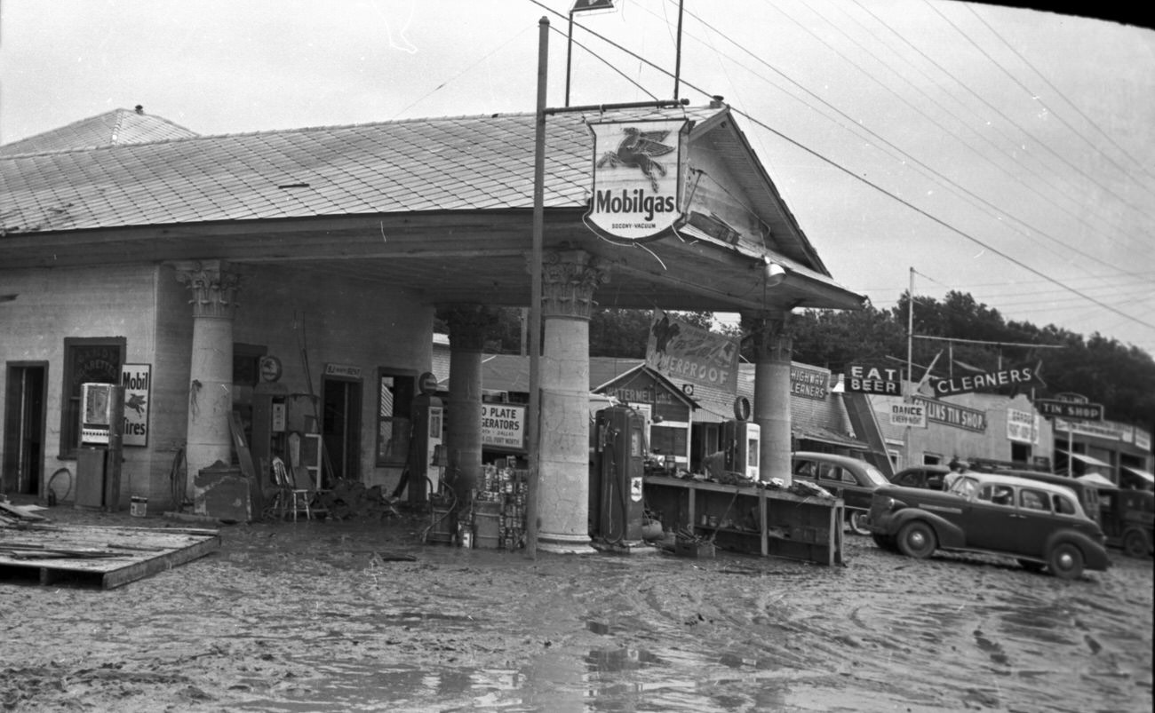 Flood scenes of commercial and residential buildings, 1949