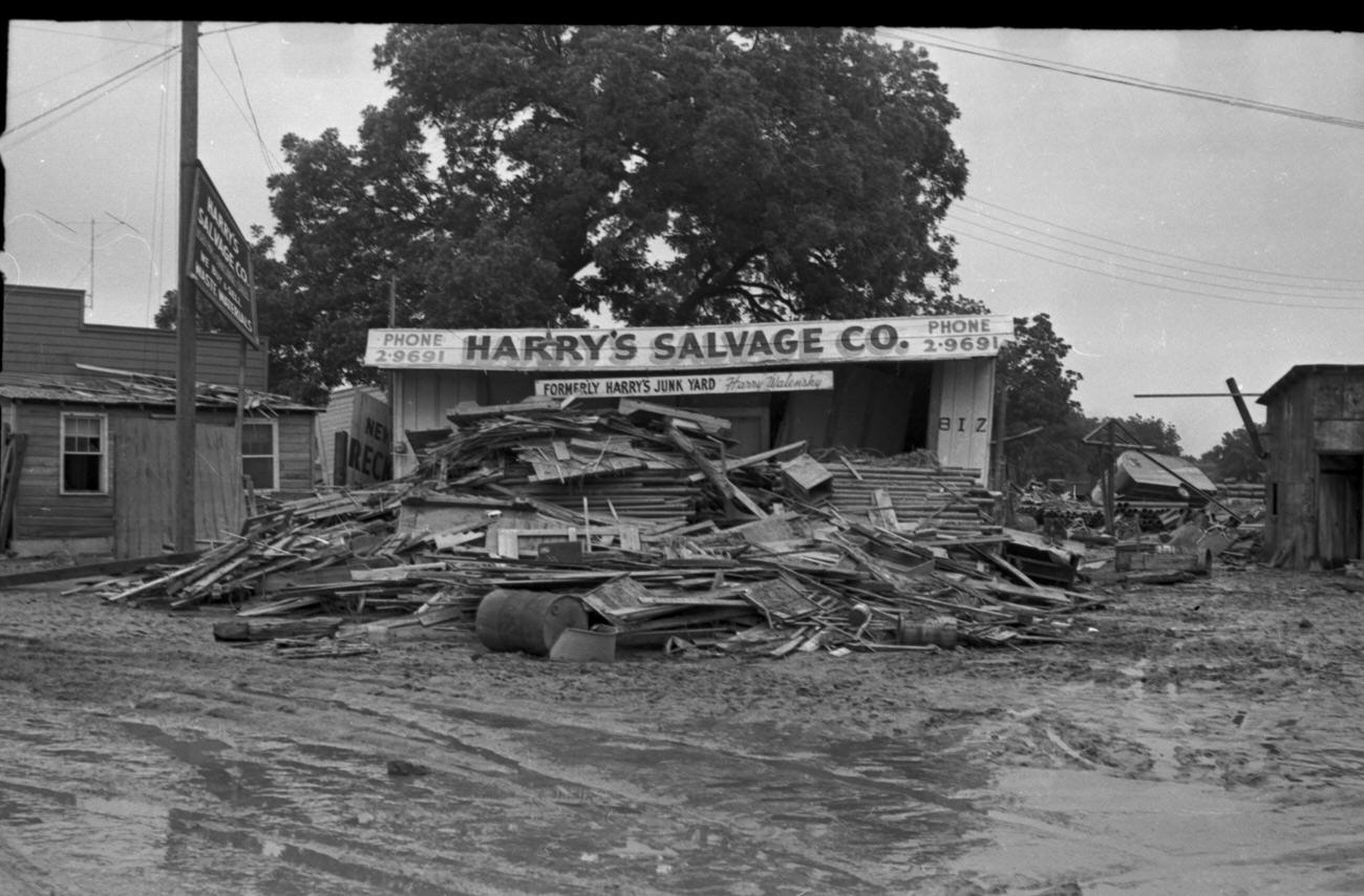 Flood scenes of commercial and residential buildings, 1949