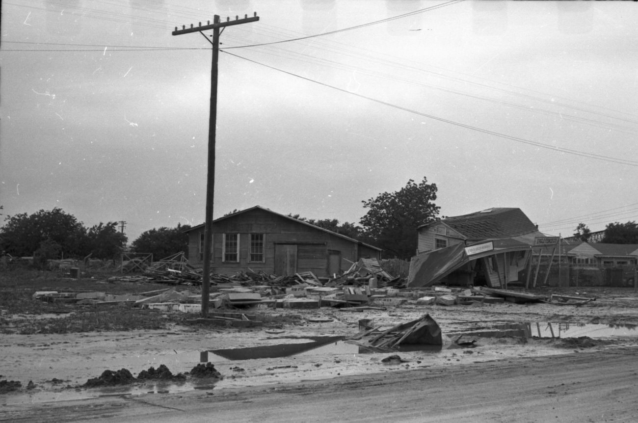 Flood scenes of commercial and residential buildings, 1949