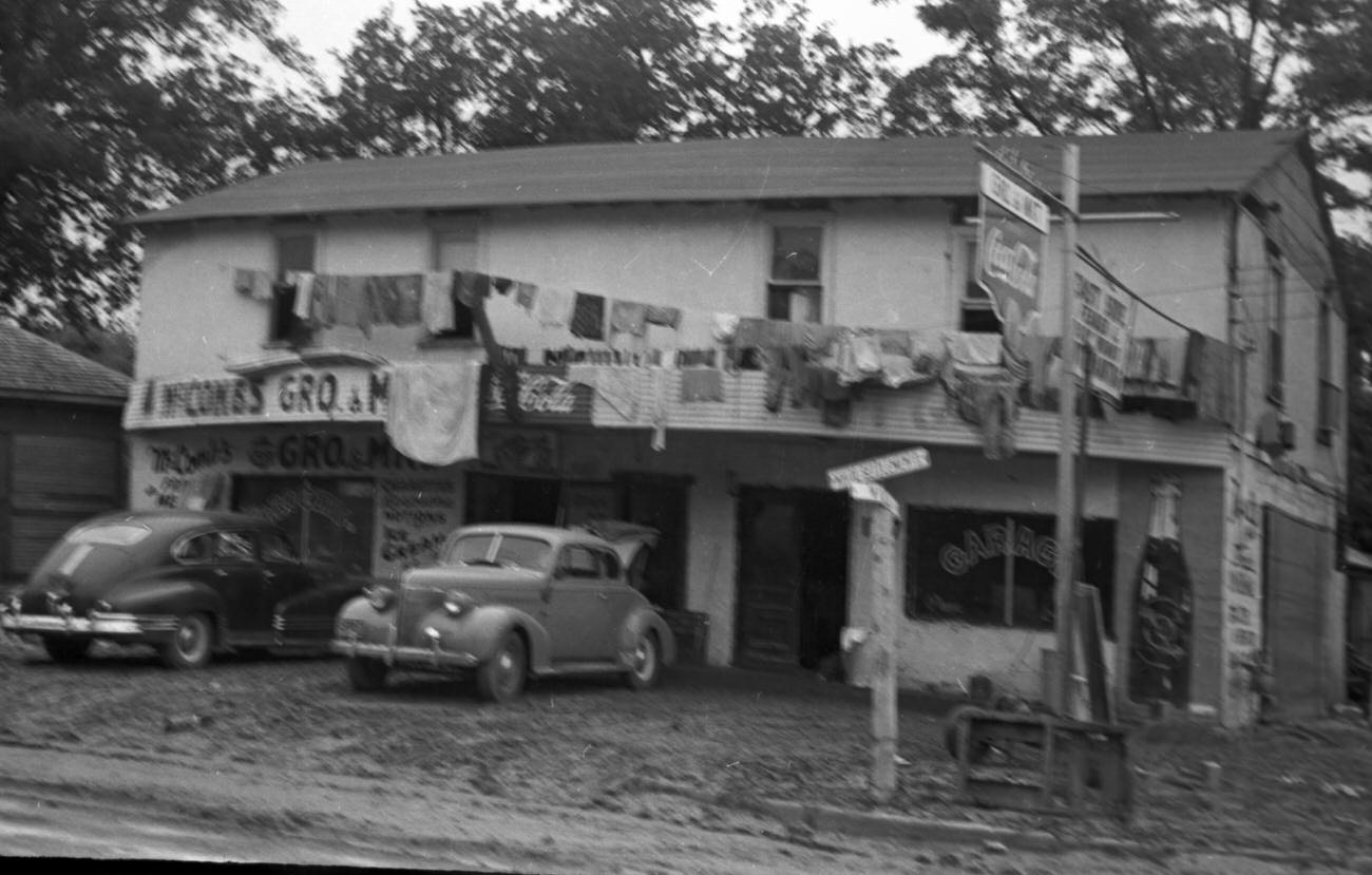 Flood scenes of commercial and residential buildings, 1949