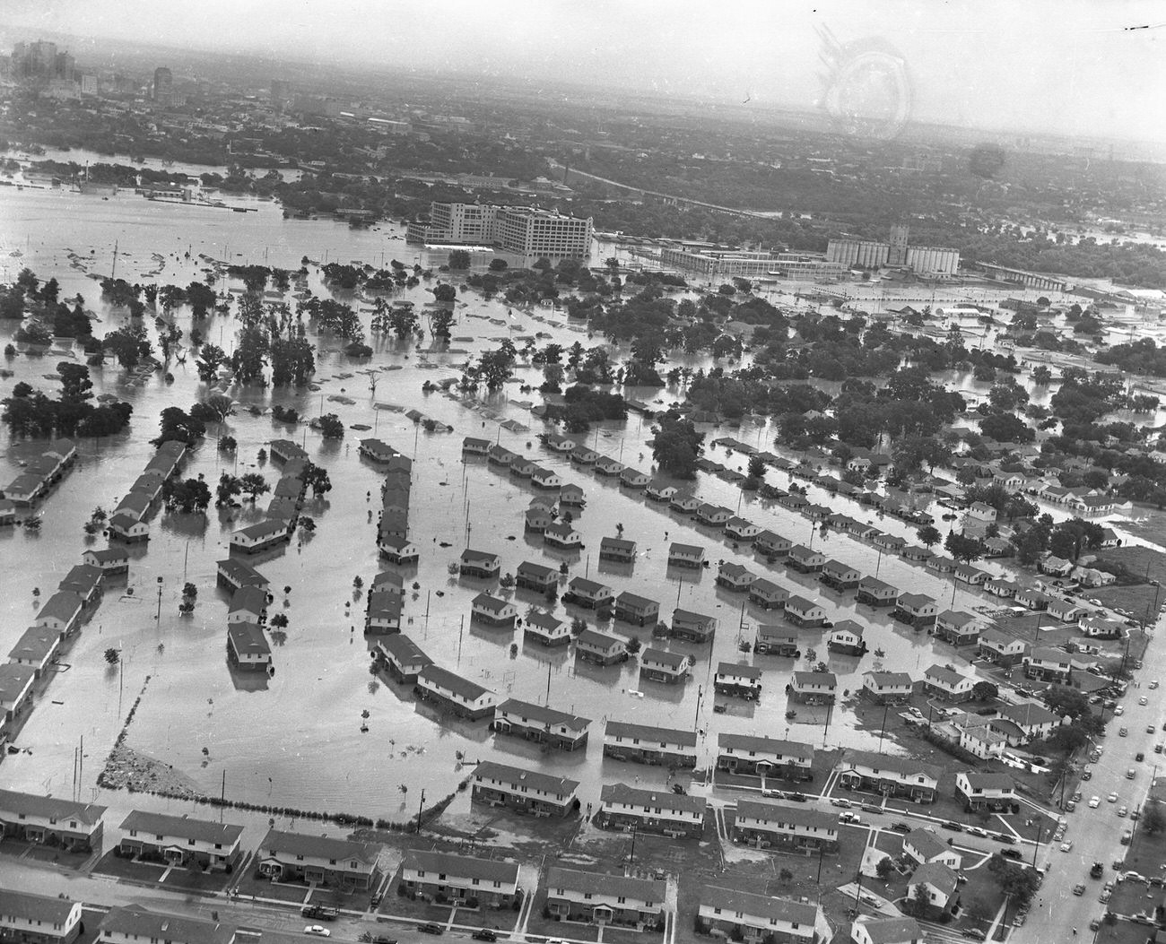 Fort Worth flood of 1949 showing a neighborhood of homes under water, 1949