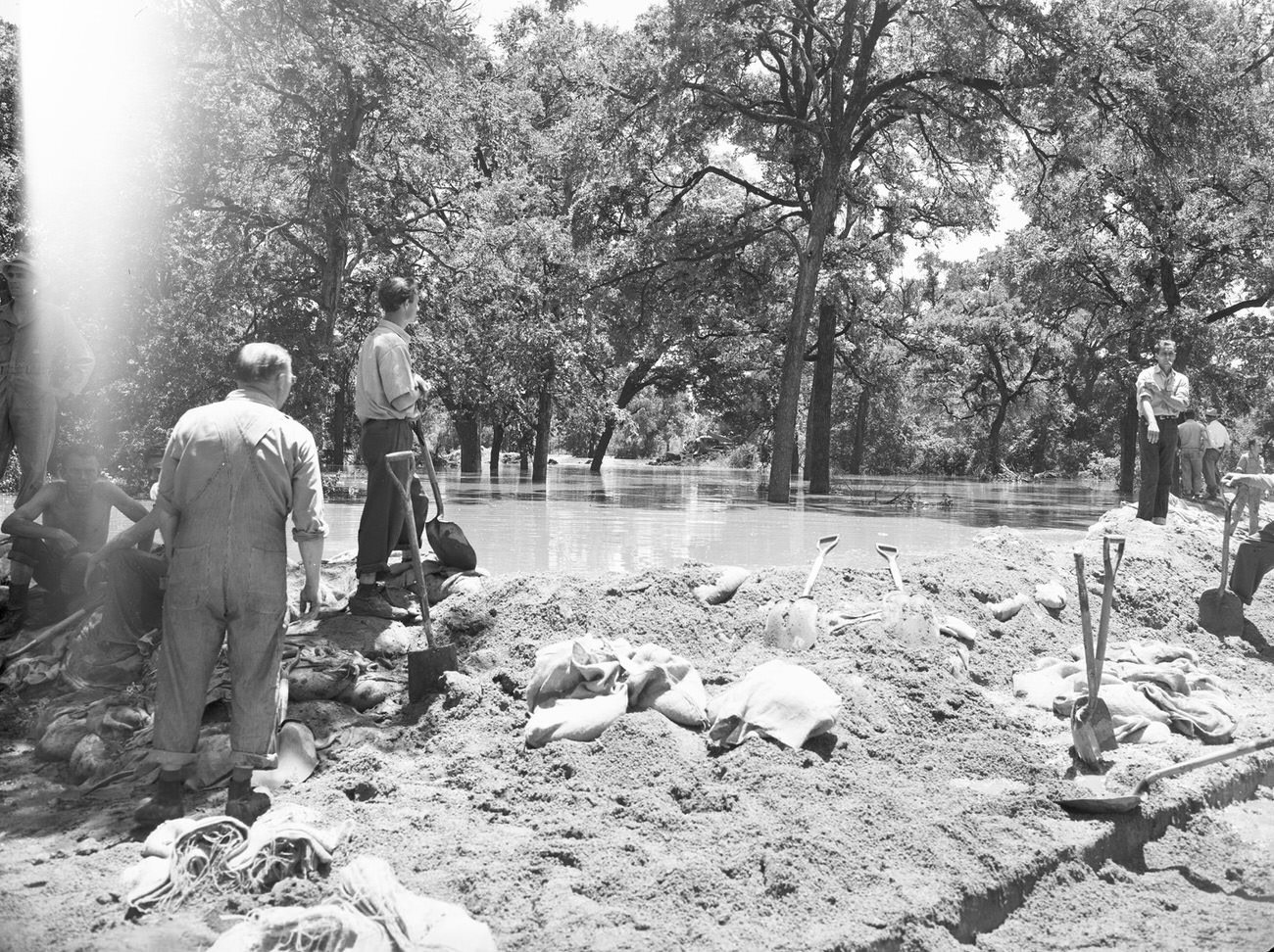Flood damage looking southeast from the levee to the park, 1949