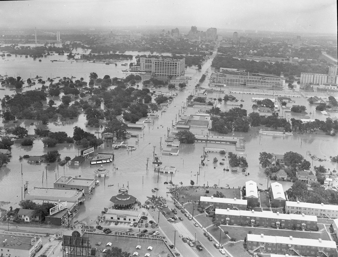 Fort Worth, Texas, flood of 1949, showing 7th Street under water. The large Montgomery Ward building in the upper center received extensive damage. Downtown Fort Worth can be seen in the distance.