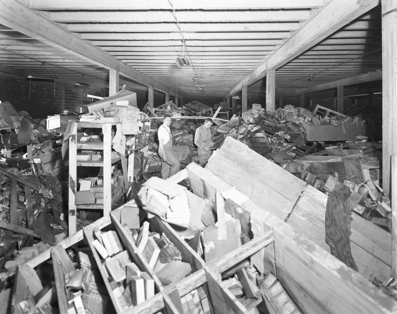 Flood damage to the interior of the Stationers Distributing Company, 1949