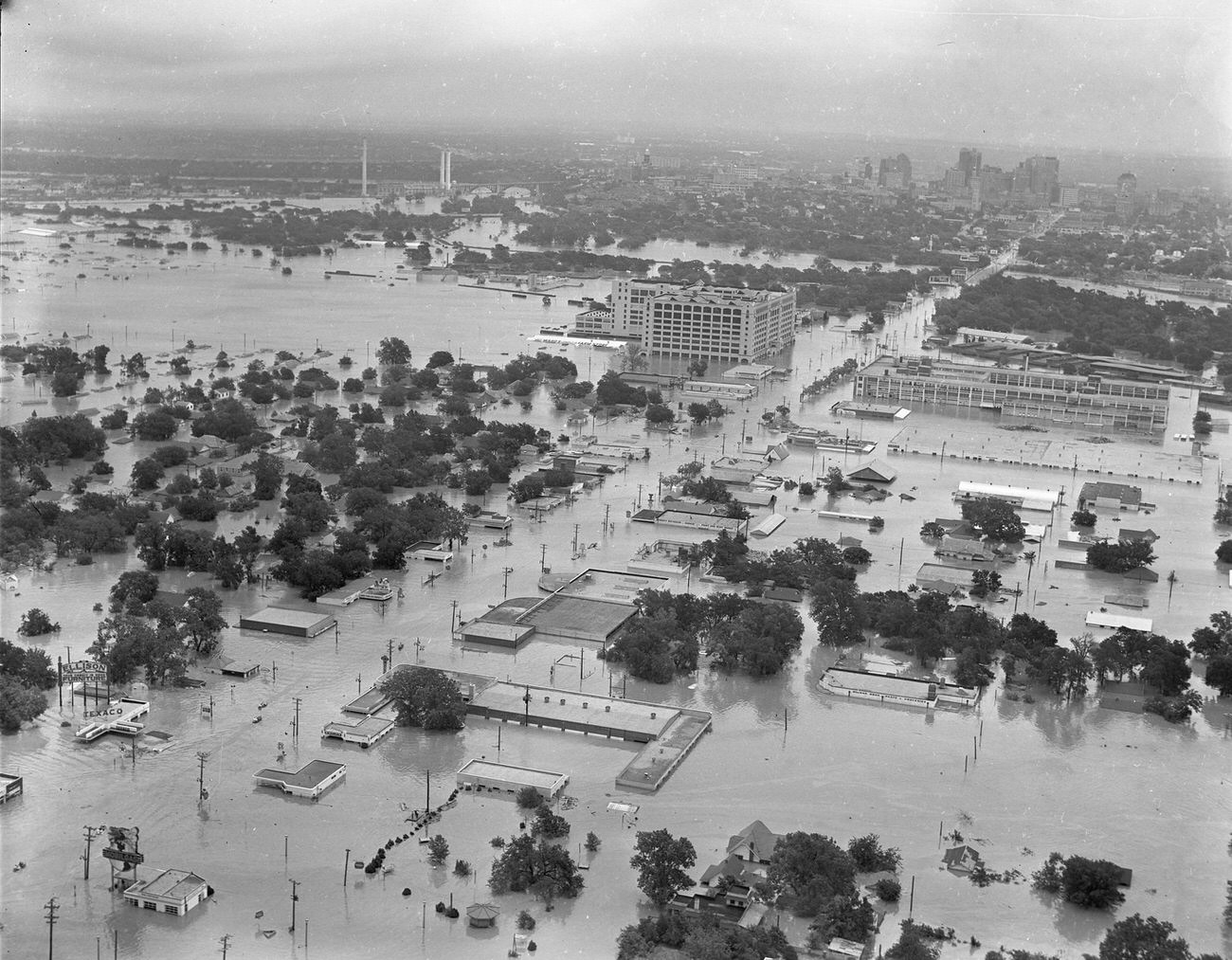Fort Worth, Texas, flood of 1949, showing 7th Street under water. The large Montgomery Ward building in the upper center received extensive damage. Downtown Fort Worth can be seen in the distance.