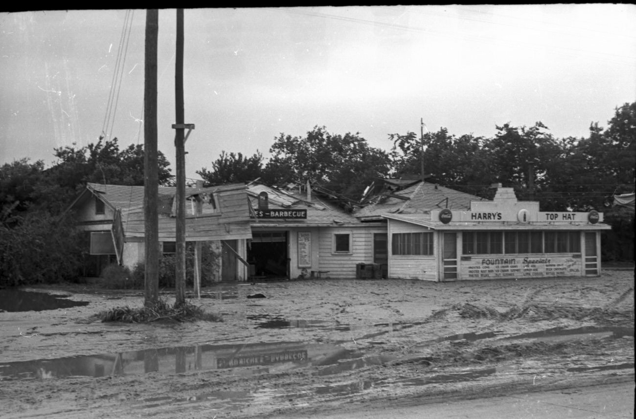 Flood scenes of commercial and residential buildings, 1949