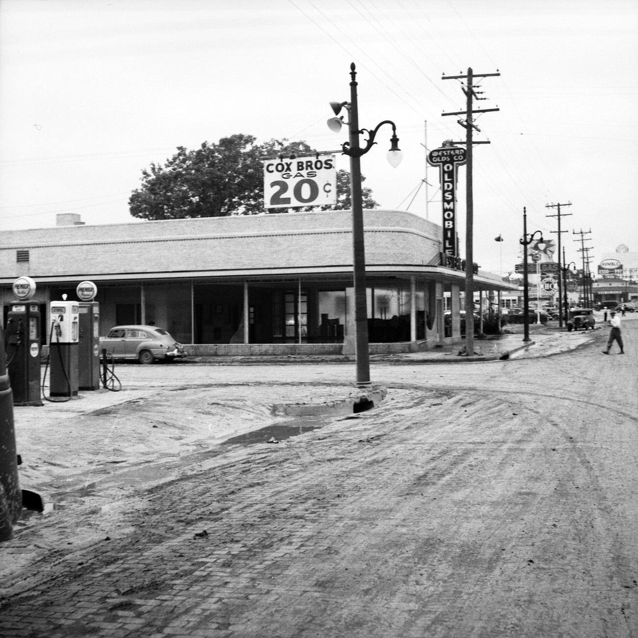 Cox Brothers Gas station after flood, 1949