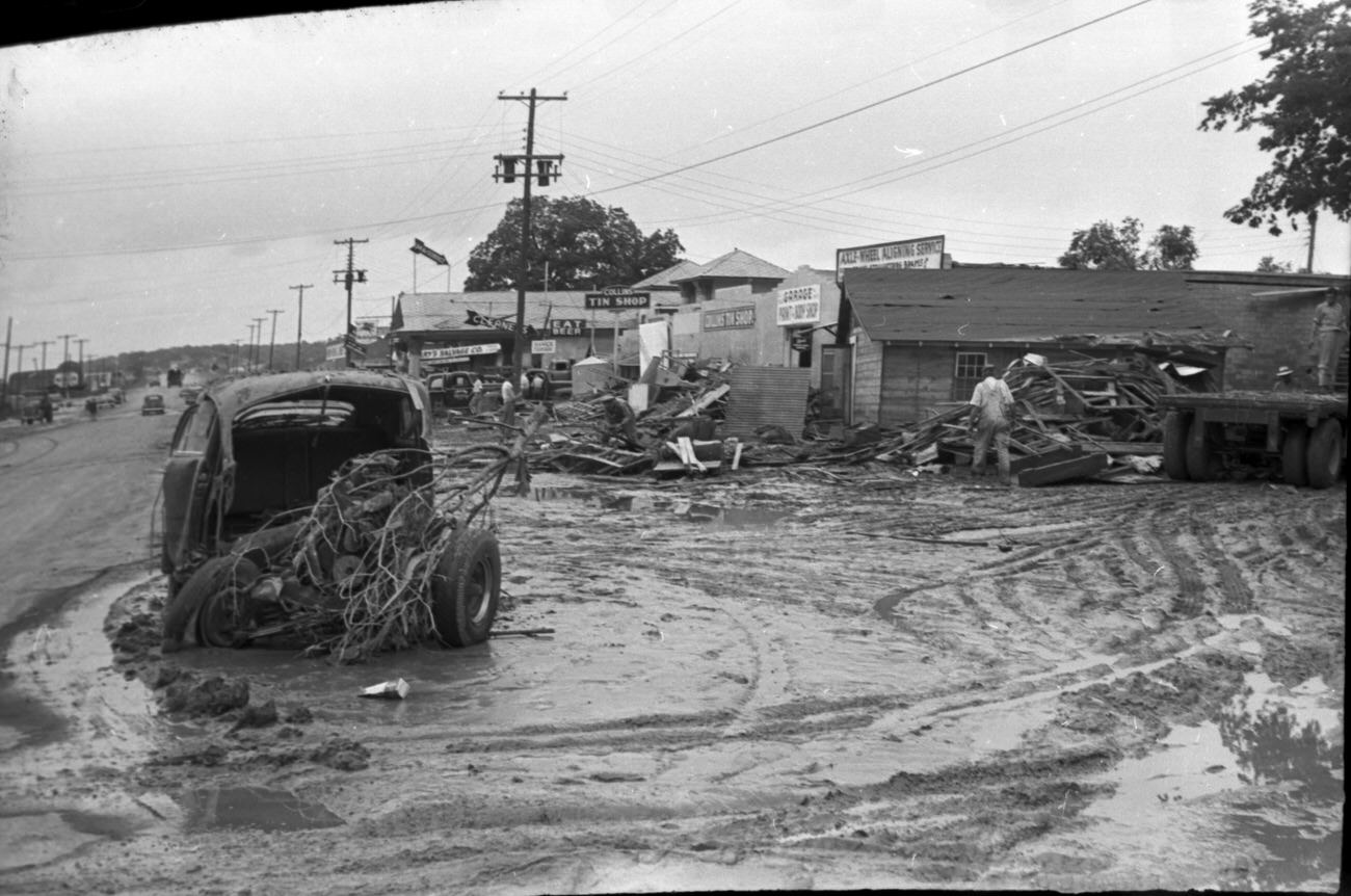 Flood scenes of commercial and residential buildings, 1949