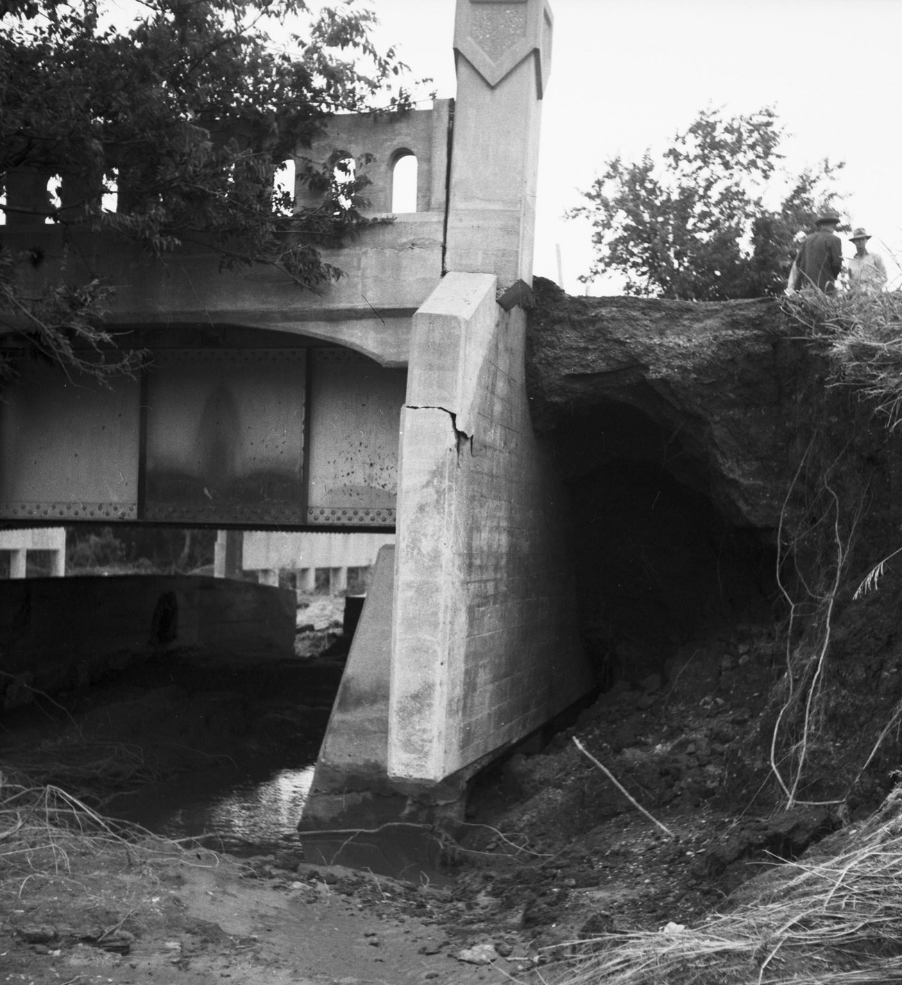 Debris on the side of a building after flood, 1949