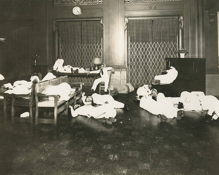 Sailors sleeping in lobby of Navy YMCA.Future Union Mission building.Dunford's Studio, 1940s