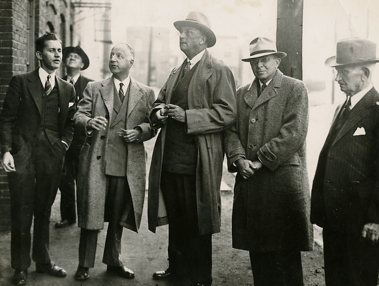 US Housing Authority, last week after inspecting An apartment-hotel building in the 800 block of Whites Avenue, in the heart of the Norfolk Slum Area, 1940s