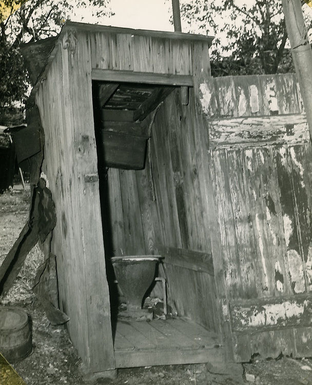 Slum Conditions. Outdoor plumbing, 1950s