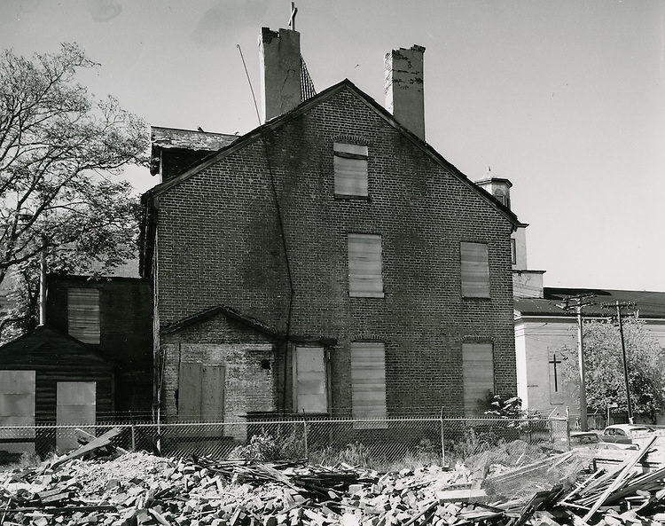 Hannon House - Cumberland St - Side View of House at SE Corner of Cumberland and Freemason Streets Boarded Up and Fenced in to Avoid Vandalism - October 05, 1961