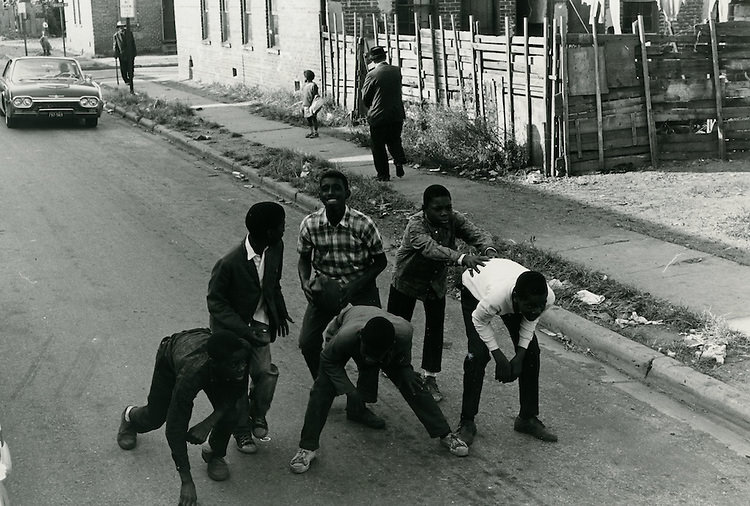 Picture of boys playing football on Lavale Street - October 27, 1966