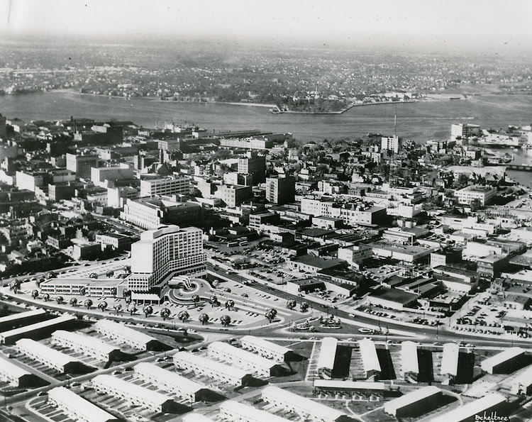 View looking at Golden Triangle site with rendering on building superimposed on site, 1970s