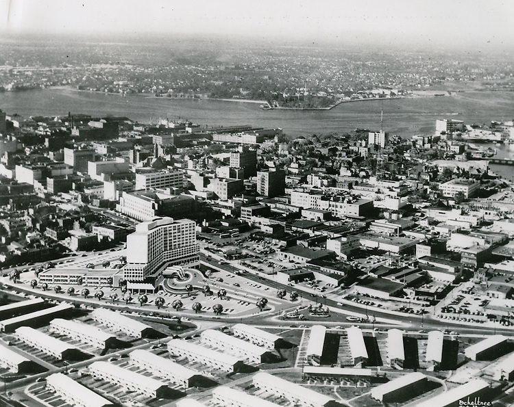 View looking at Golden Triangle site with rendering on building superimposed on site, 1970s