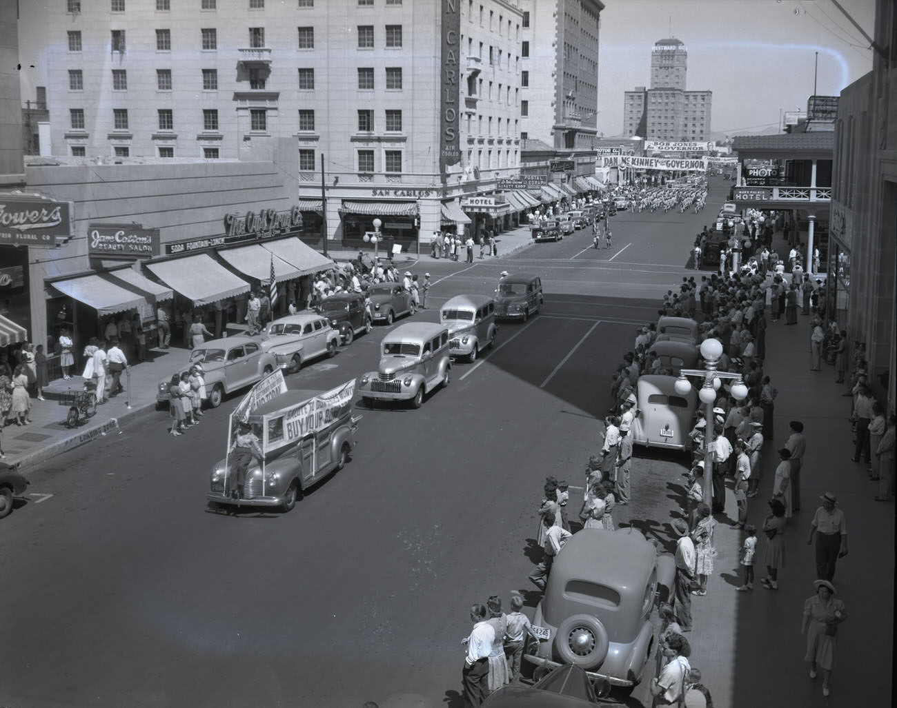 U.S. Bond Parade, 1942. The parade is moving south on Central Ave. at the intersection of Central Ave. and W. Monroe St.